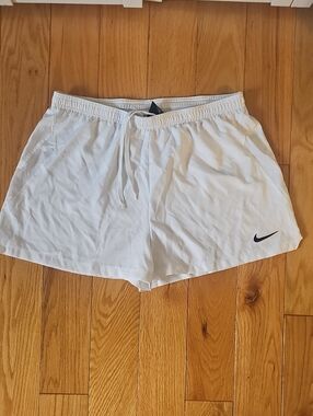 Nike White Athletic Running Shorts with Black Swoosh